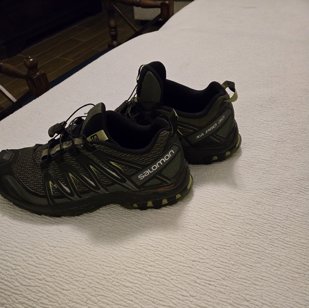 Salomon Black Athletic Shoes with Rugged Design and Sturdy Sole